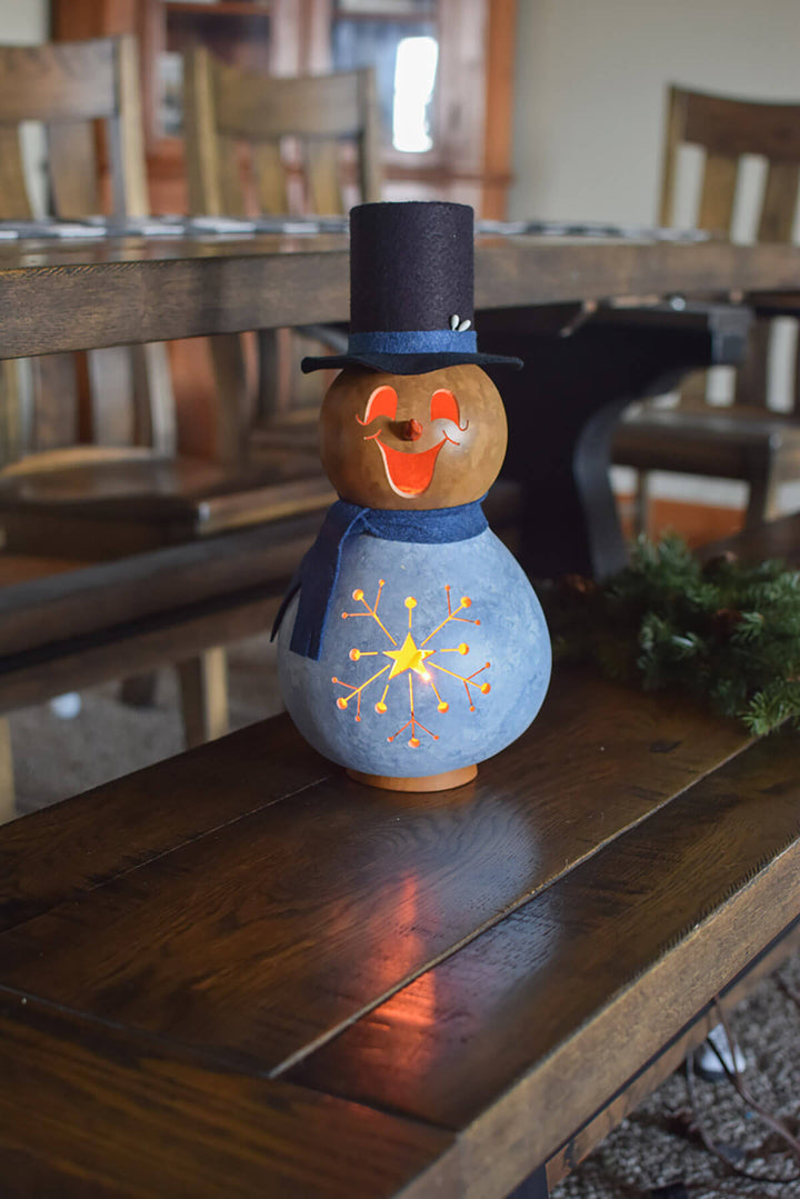 Blue Gabriel the snowman gourd at Meadowbrooke Gourds.