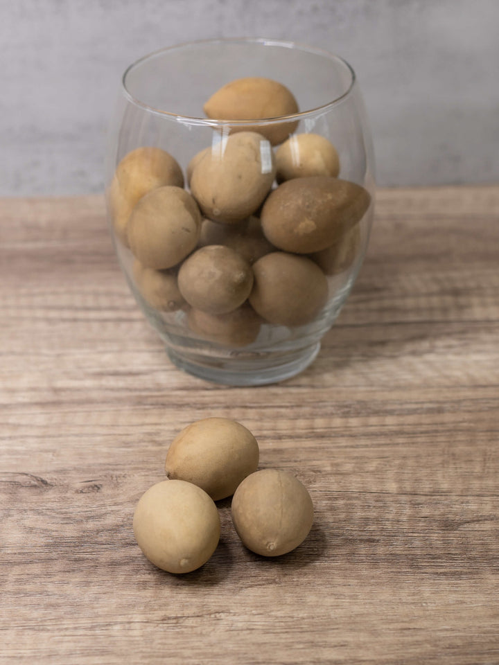 Raw unfinished gourd eggs in a glass bowl at Meadowbrooke Gourds