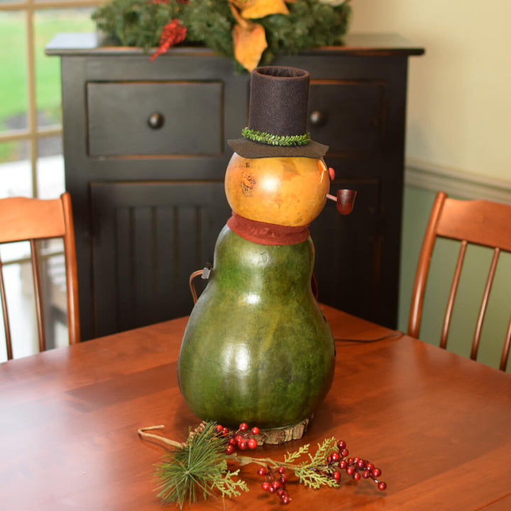 Large Lit Pinewood Snowman Gourd at Meadowbrooke Gourds. Right Side View