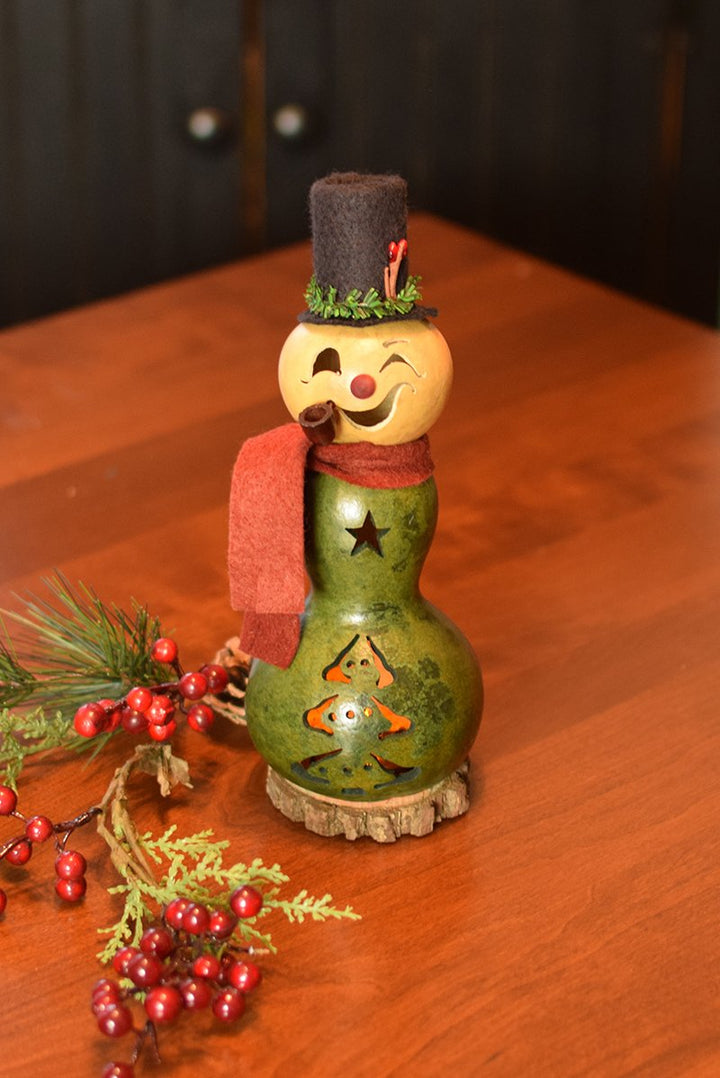 Miniature Pinewood snowman gourd at Meadowbrooke Gourds